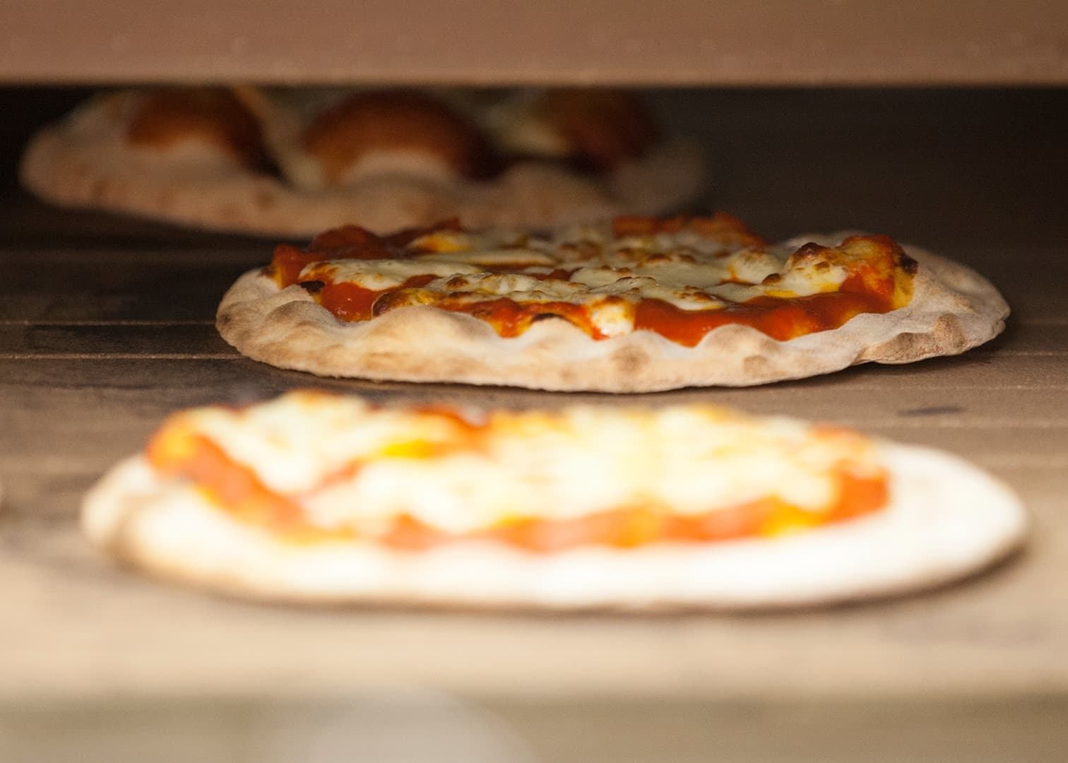 Pizzas In Oven