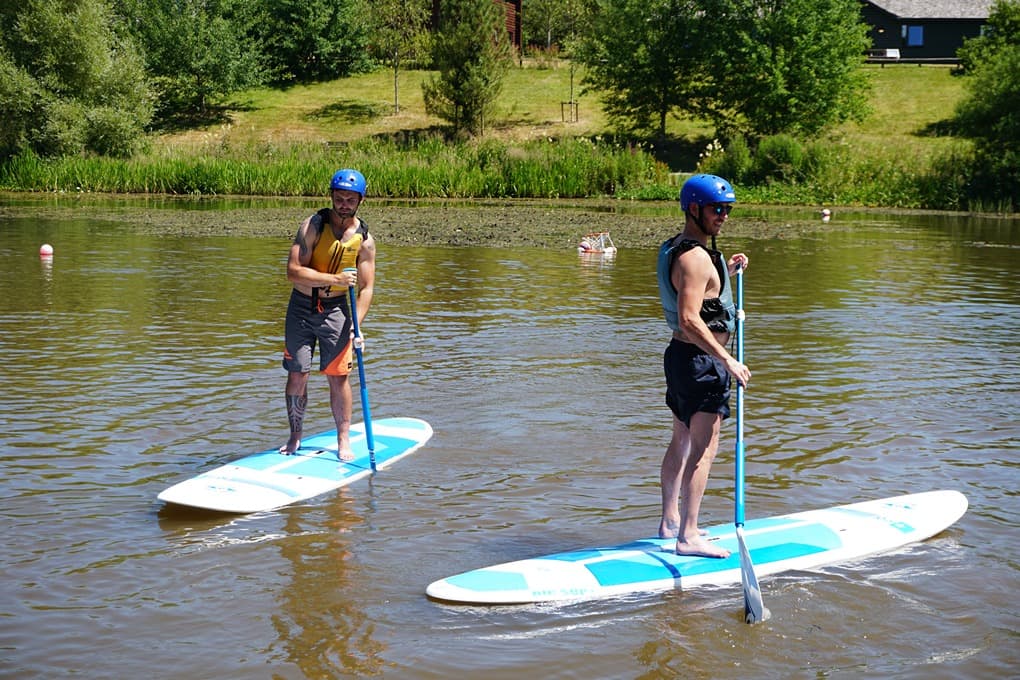 Two Men Paddleboarding