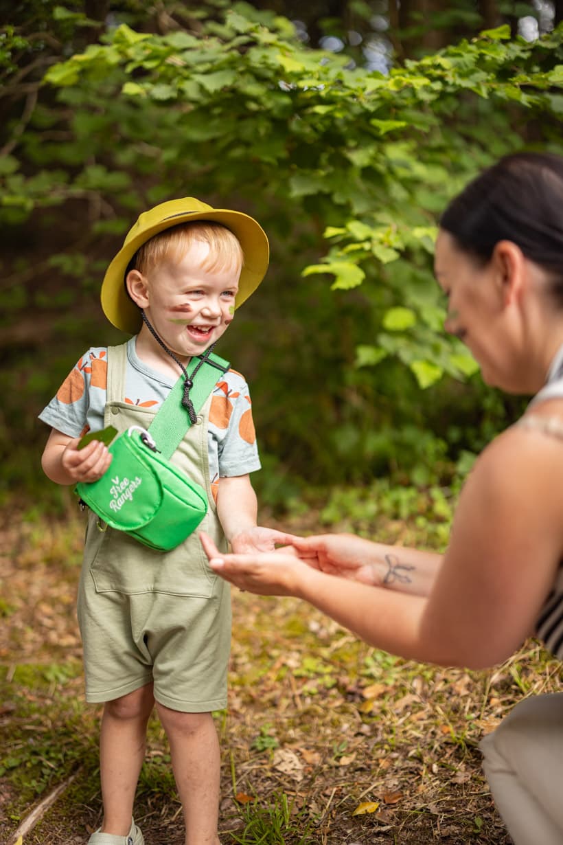 Outdoor detectives boy with leaf