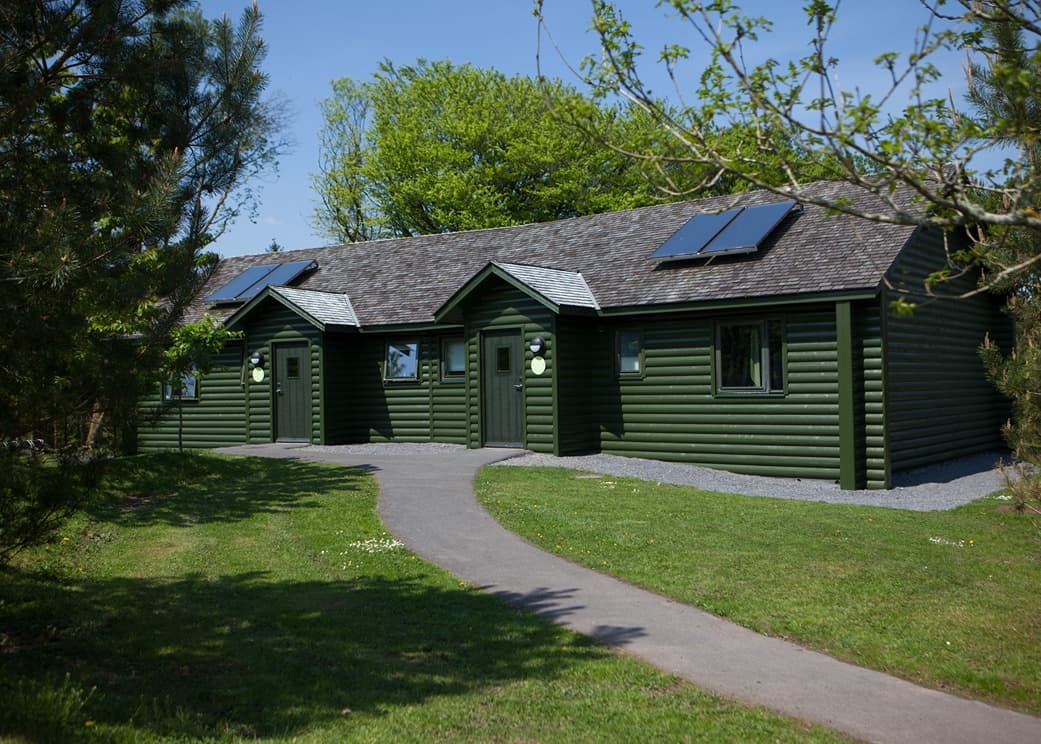 Caldey Lodges with path