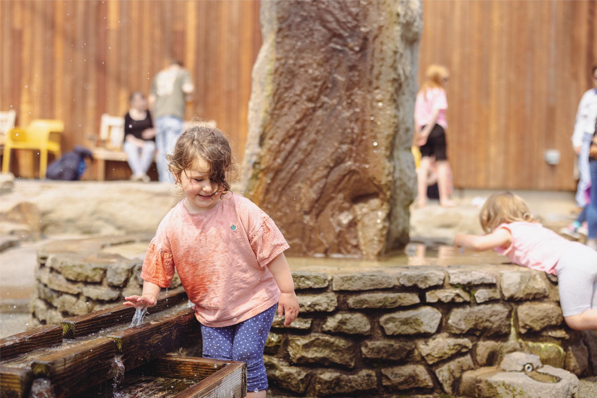Girl Playing In Water Play