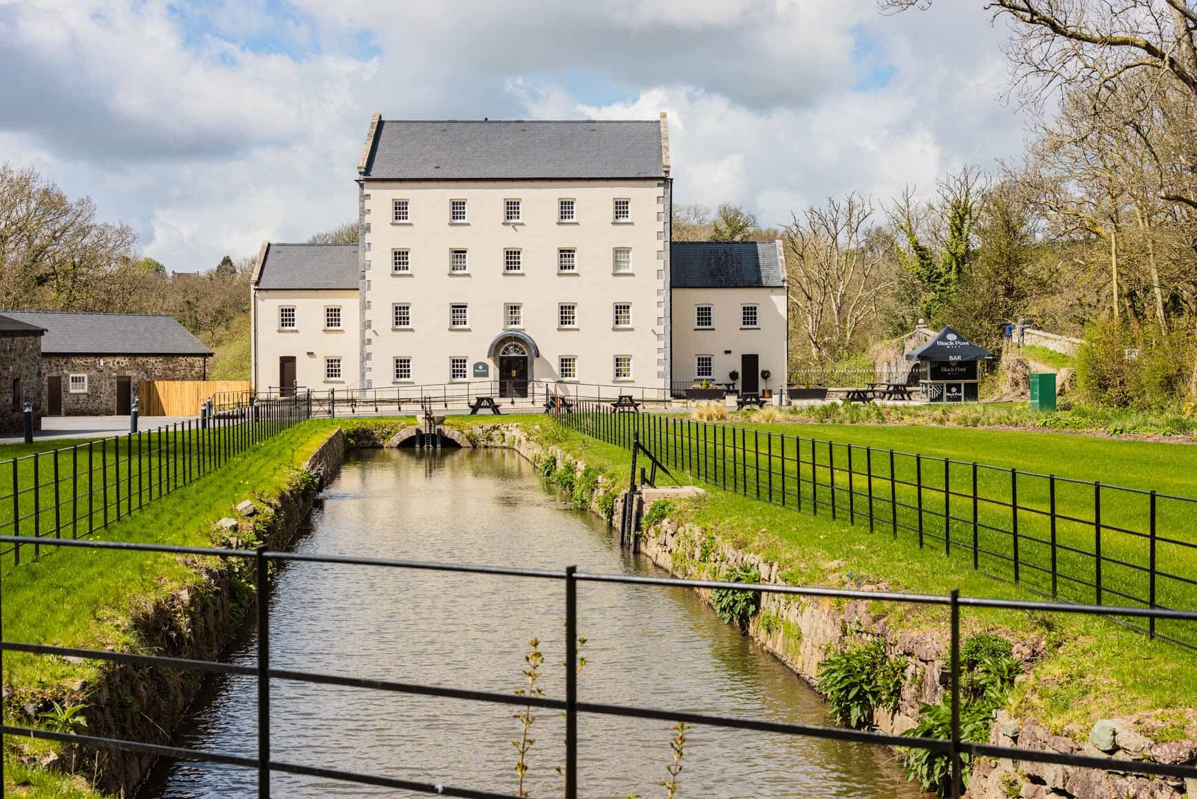 Black Pool Mill Exterior And Leat