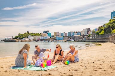family on beach Tenby summer