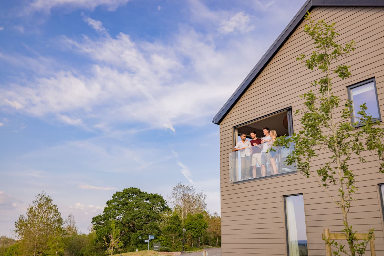 Friends looking out of Carningli Lodge sunroom