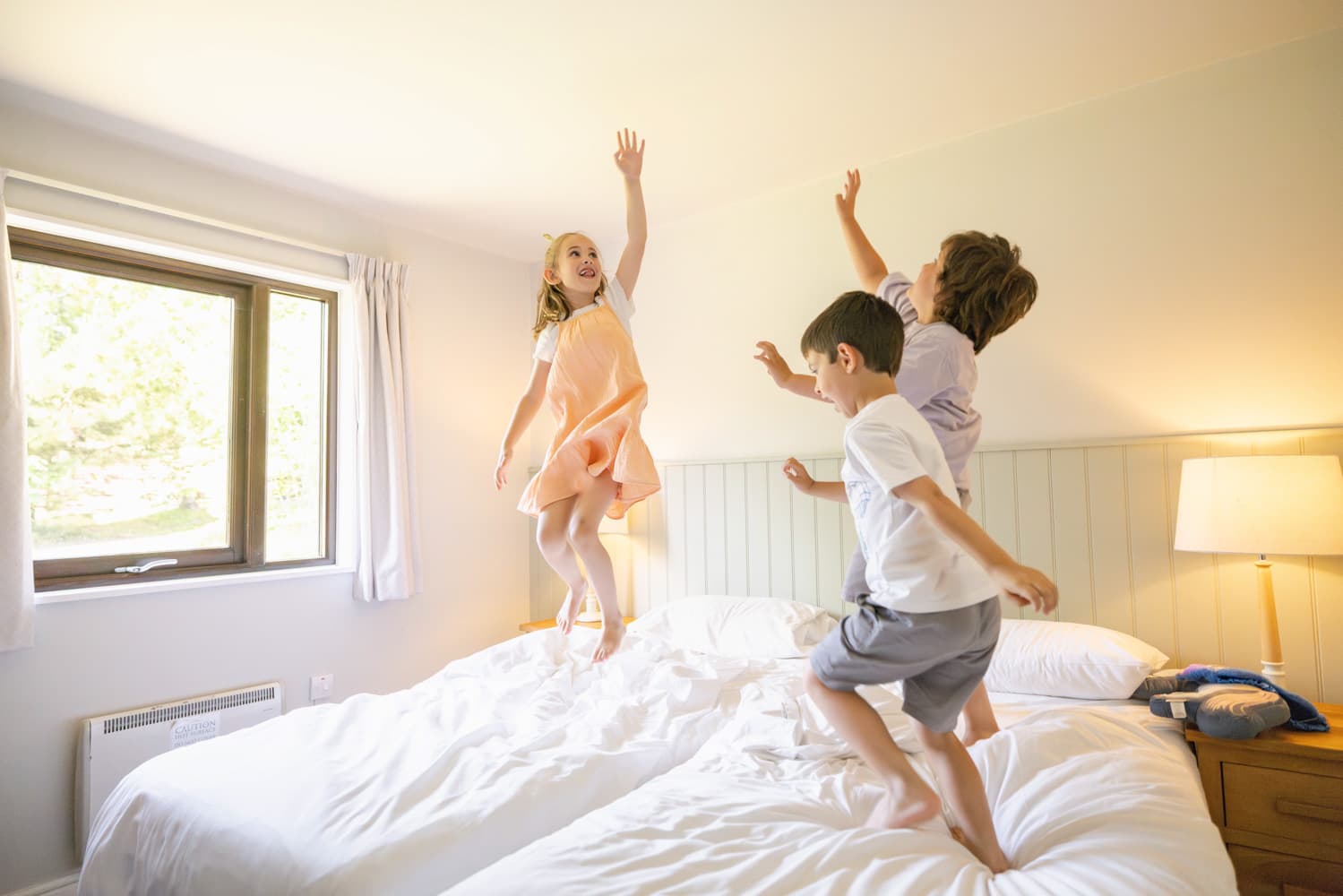 Children playing on bed Bluestone