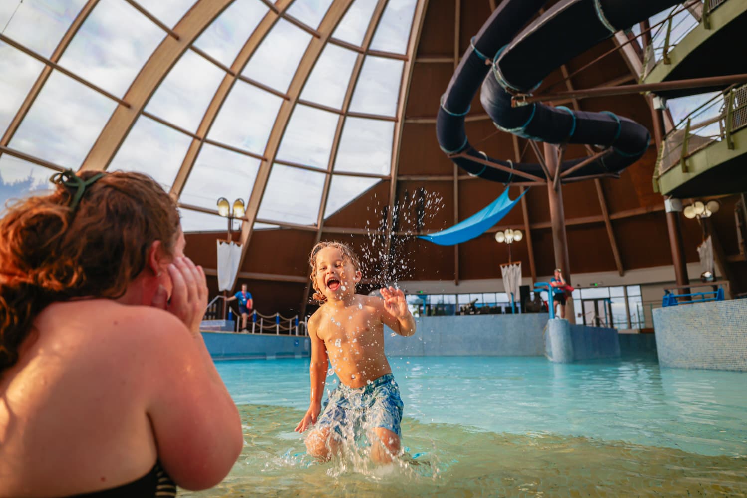 Blue Lagoon Mum And Boy Splashing