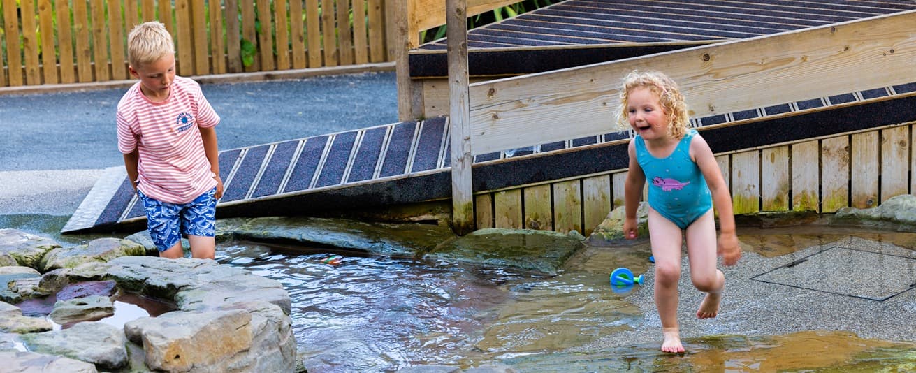 Water Play, Girl And Boy Playing