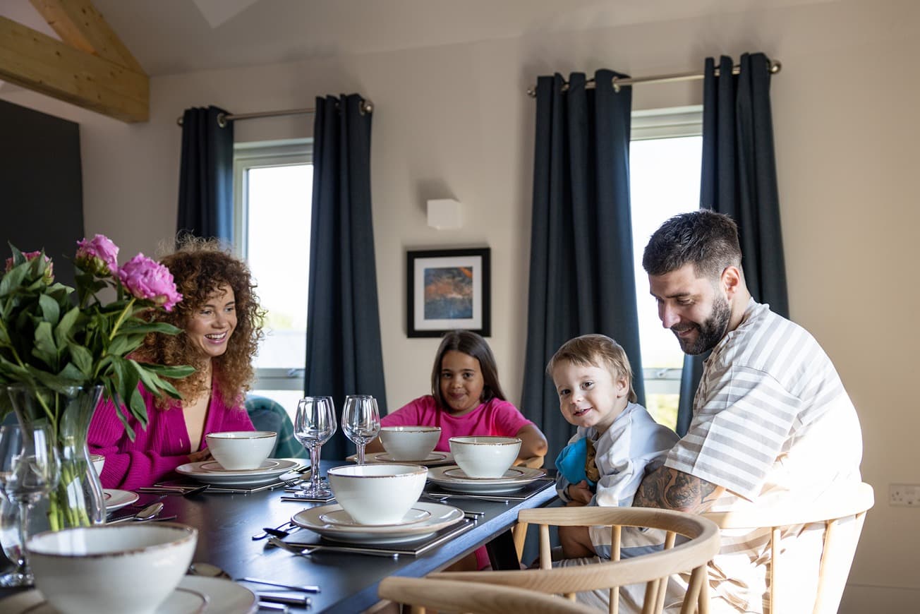 Carningli Lodge Family At A Table