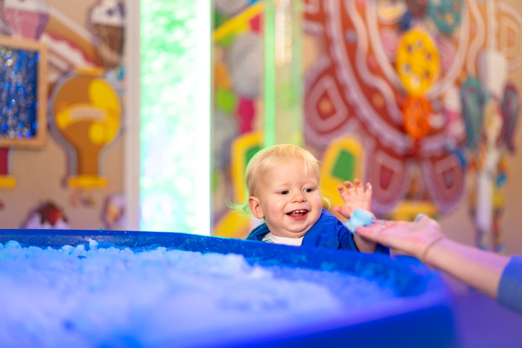 Child Playing With Foam At Messy Play