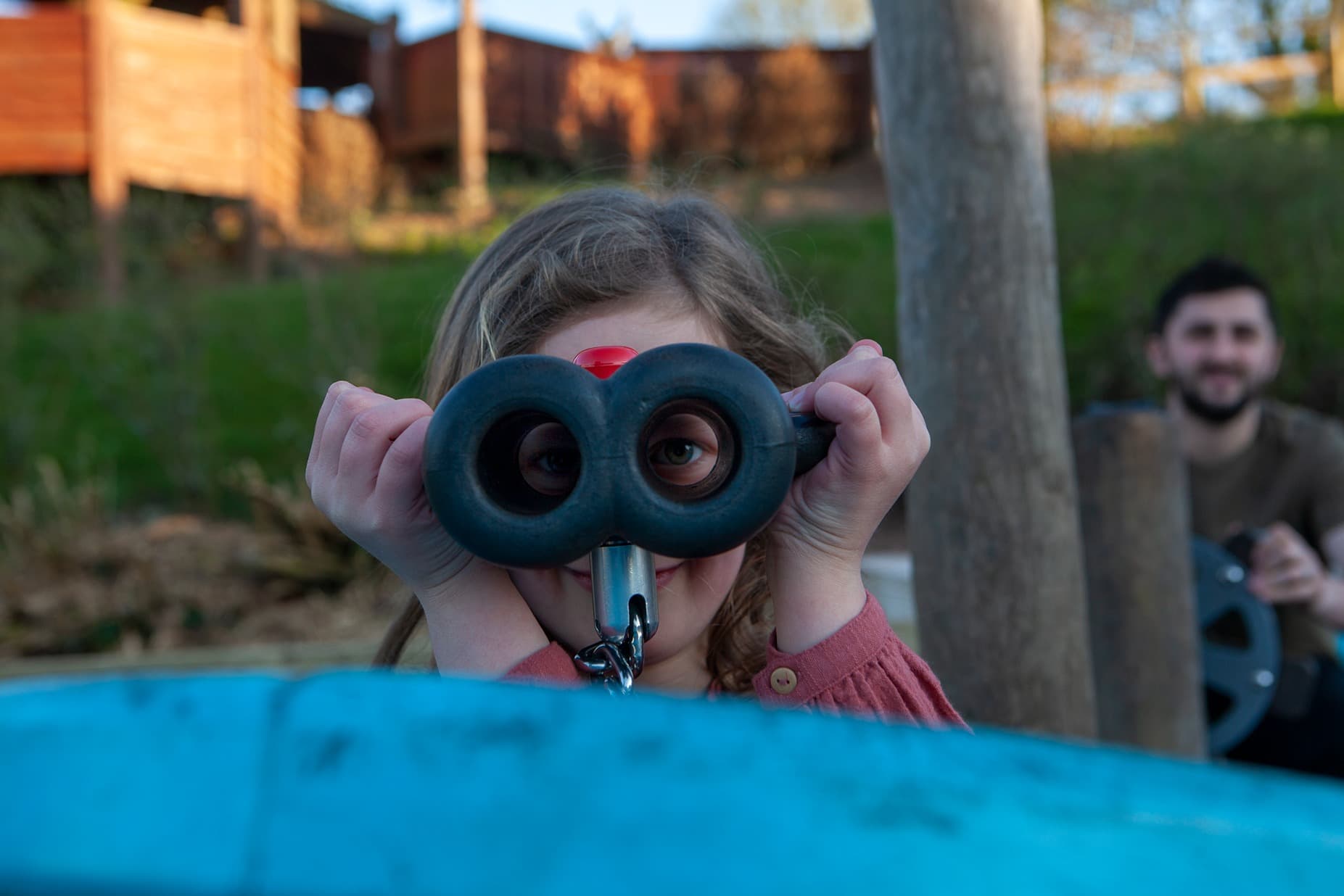 Girl Looking Through Binoculars
