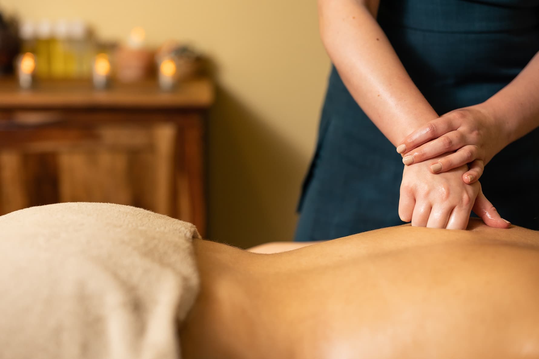 Massage to top of back
