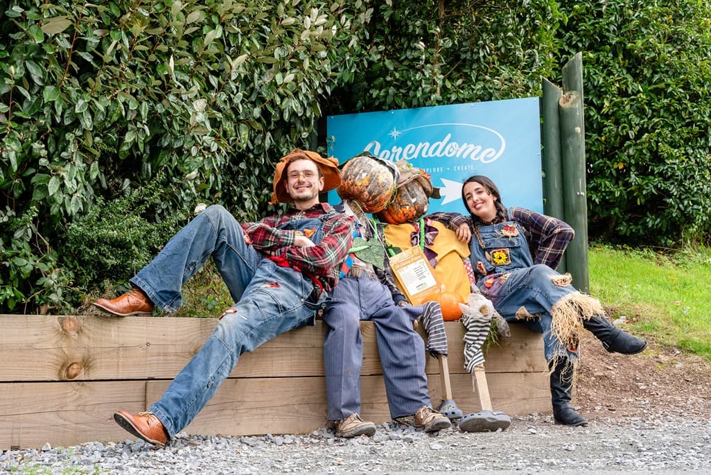 Scarecrows sitting down