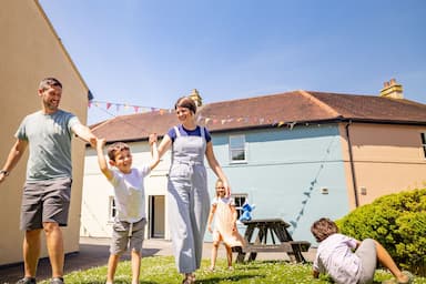 Family village Summer playing Bluestone