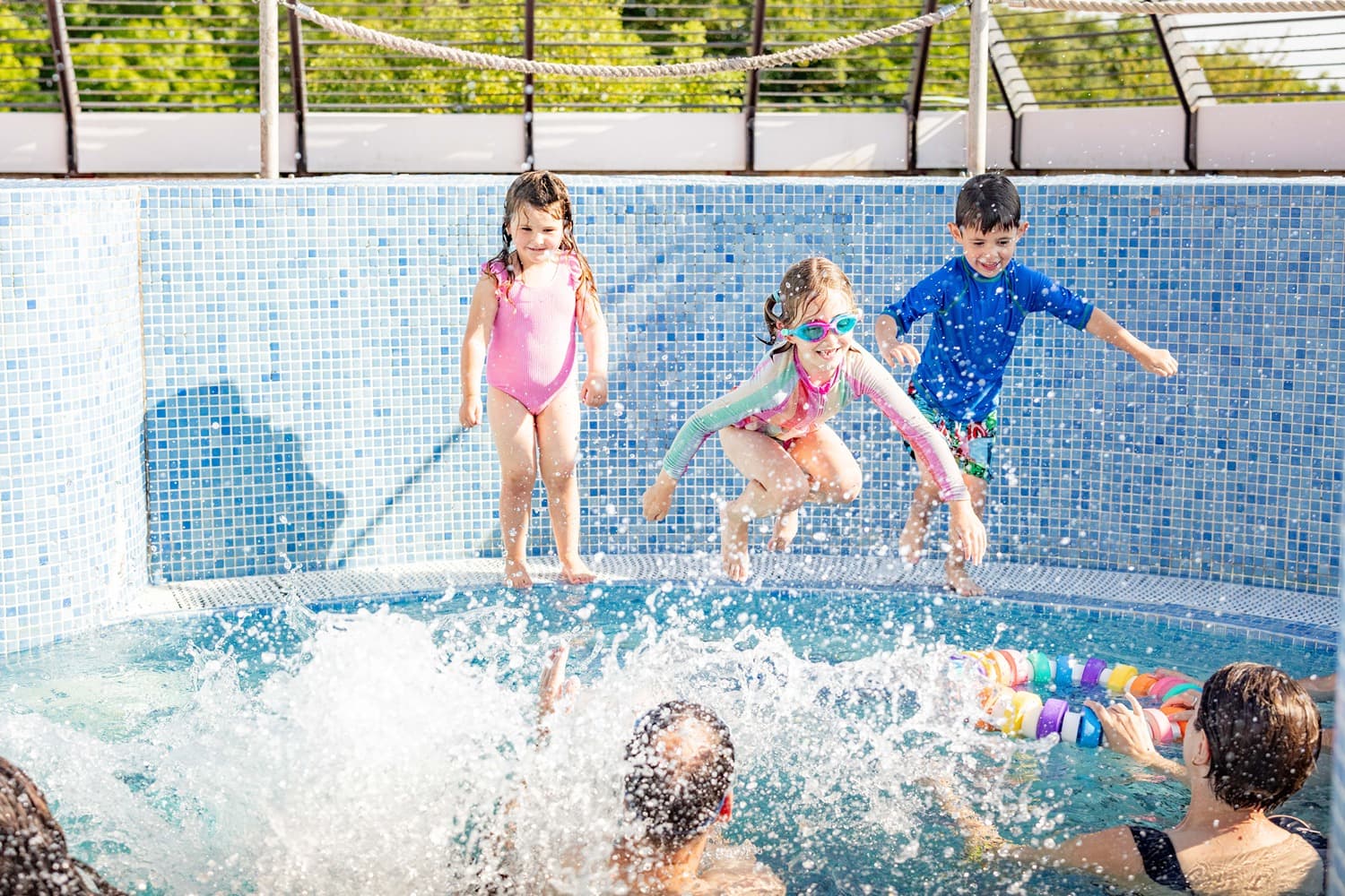 Kids Jumping At Blue Lagoon