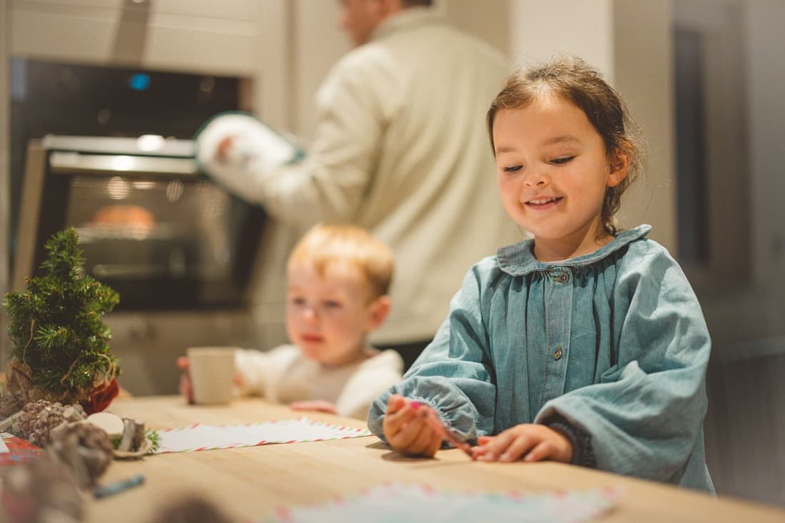 Girl and boy in lodge Christmas Bluestone