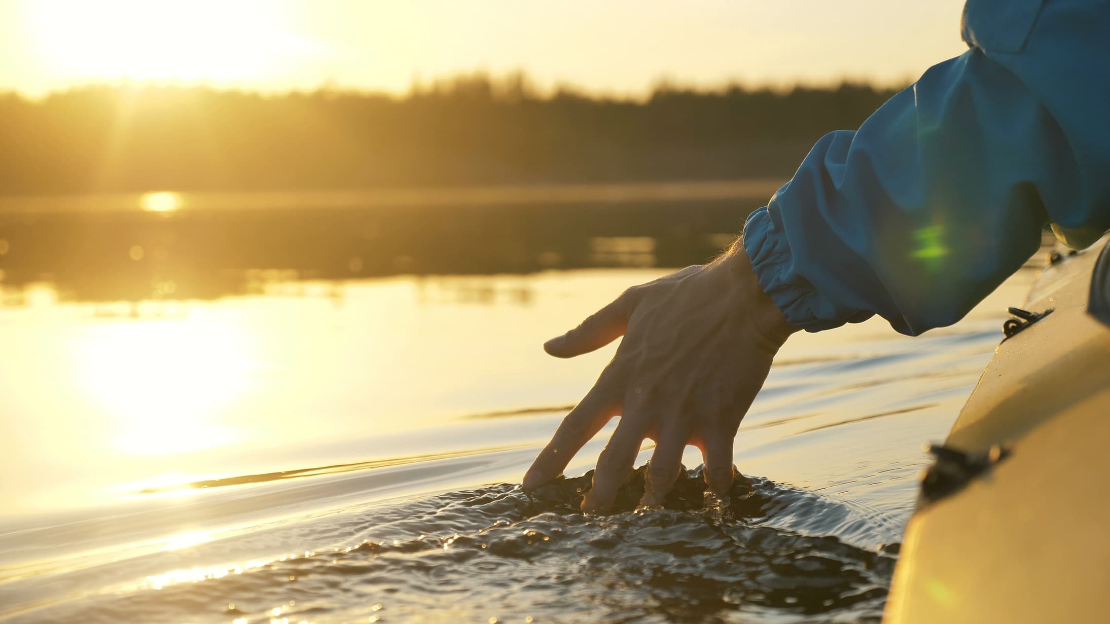 Double Kayak Hand In The Water
