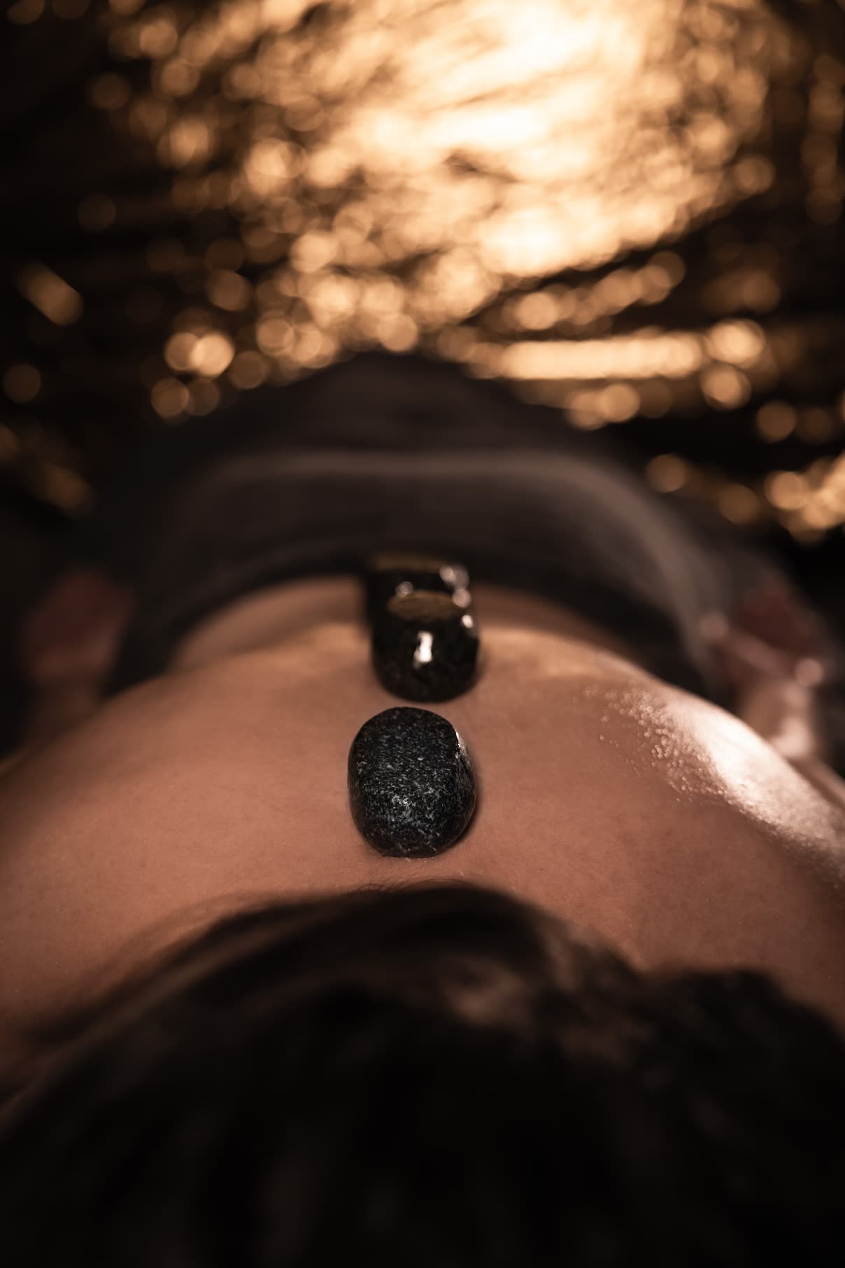 Hot stones on back