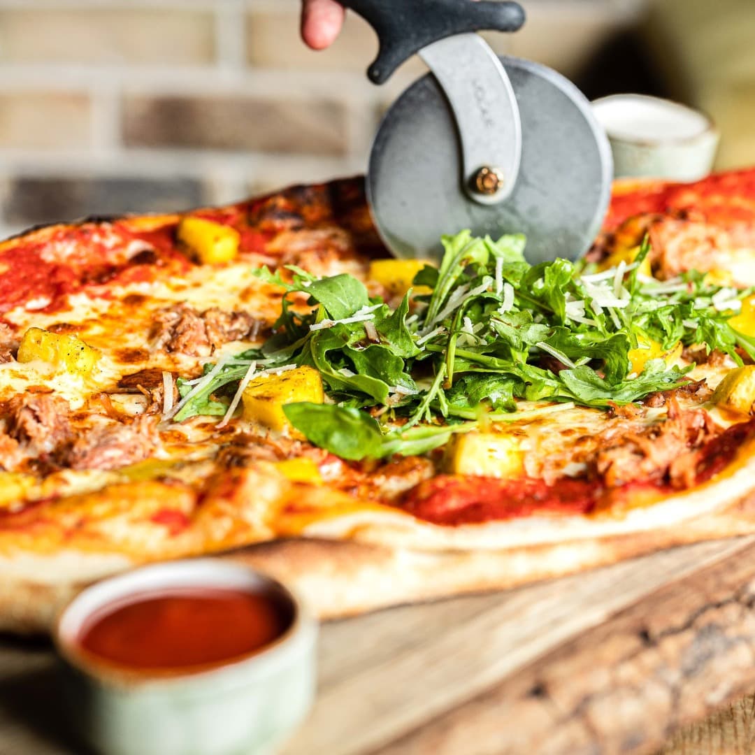 It's National Pizza Day! Celebrate with a slice at The Oak Tree Restaurant. 🍕

[Insert cheesy pizza joke here]

 #NationalPizzaDay