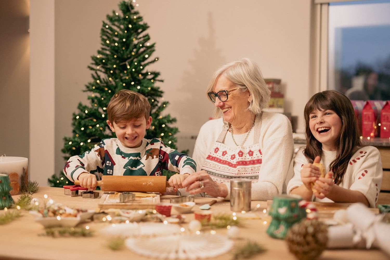 Family in lodge baking Christmas Bluestone