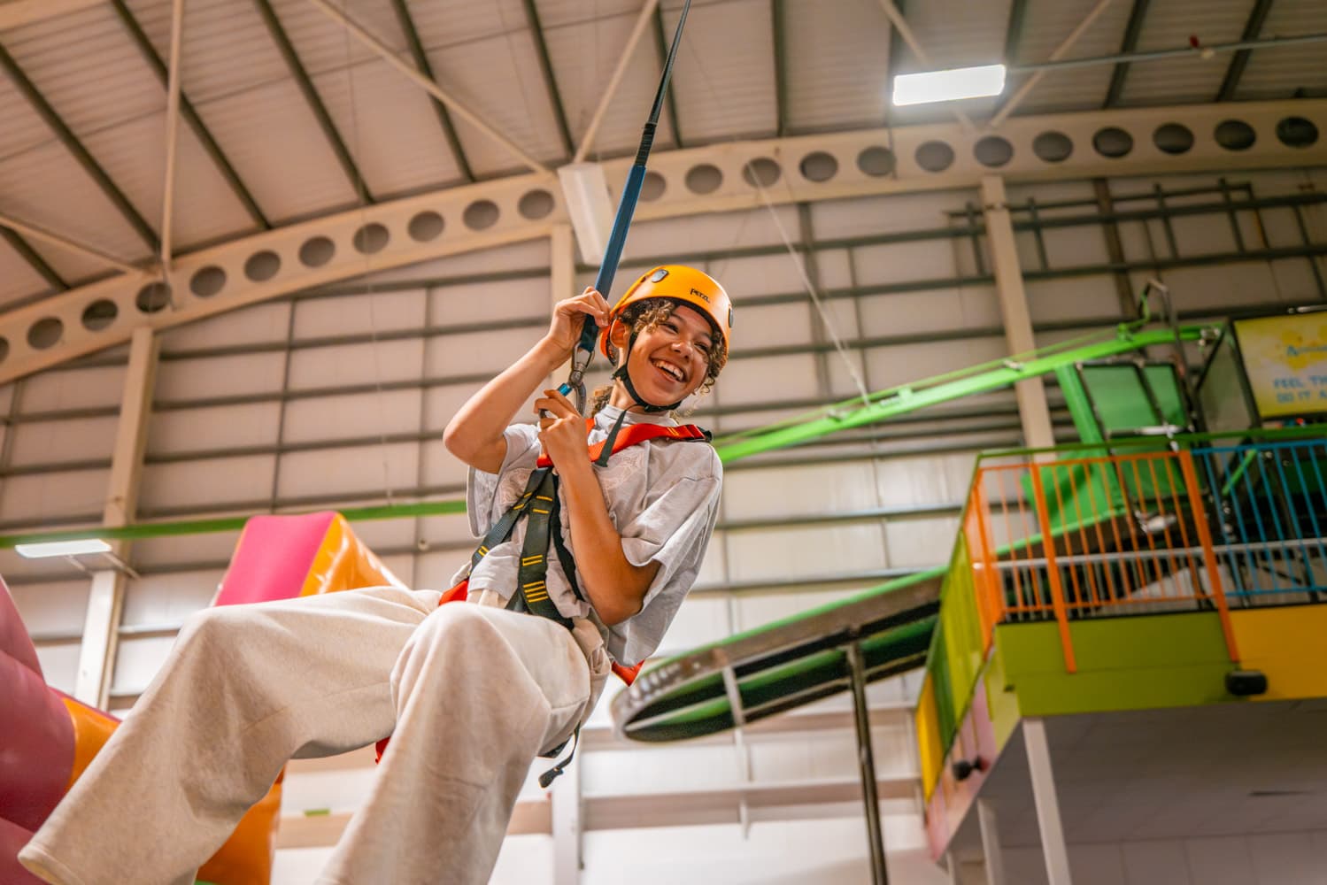 Adrenaline Hive Teenage Girl In Harness Smiling