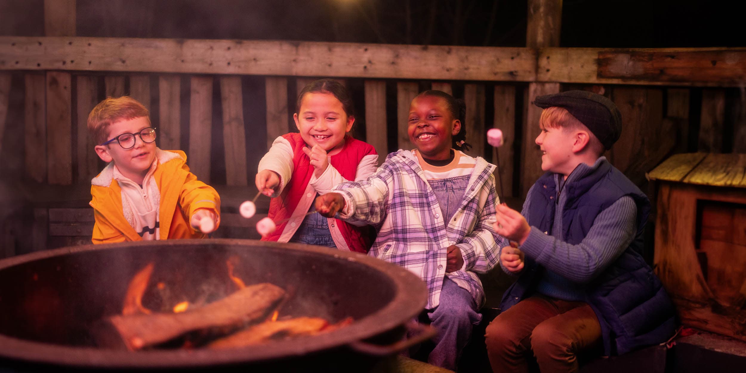 Kids at Camp Smokey with marshmallows