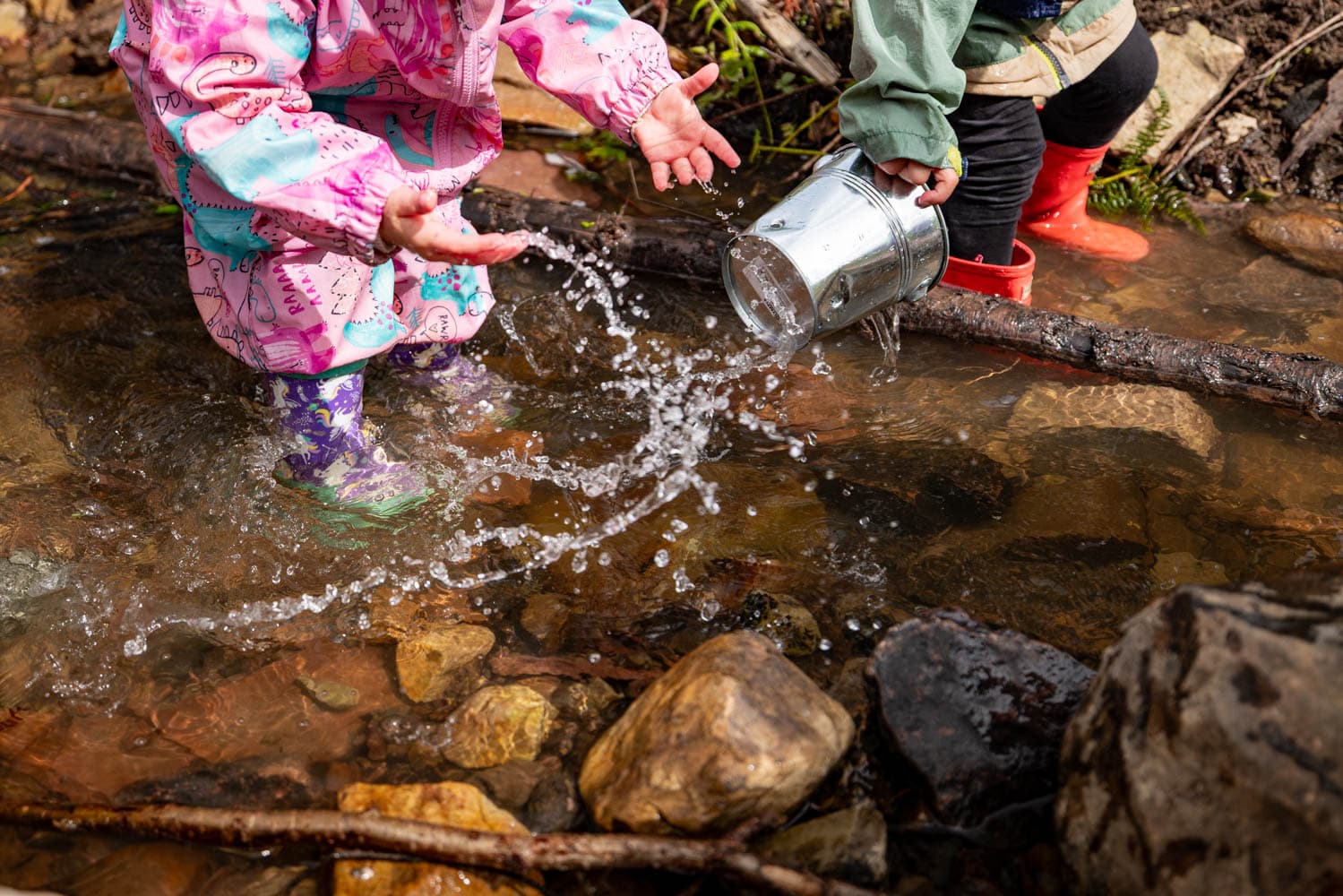 Mud Mission Wellies In The Wild splashing at Bluestone