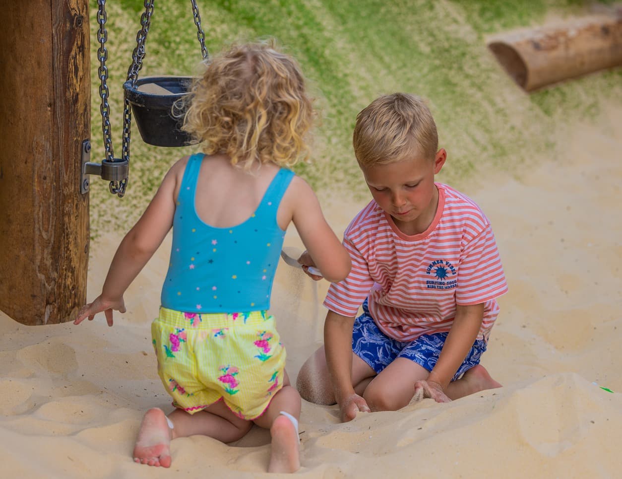 Sand Play Boy And Girl Playing